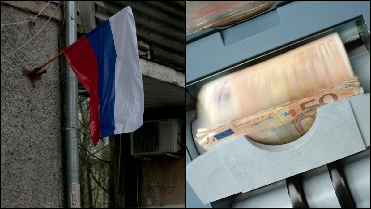 Ruská vlajka a ppeniaze v bankomate.