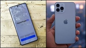 xiaomi na stole a iphone v ruke