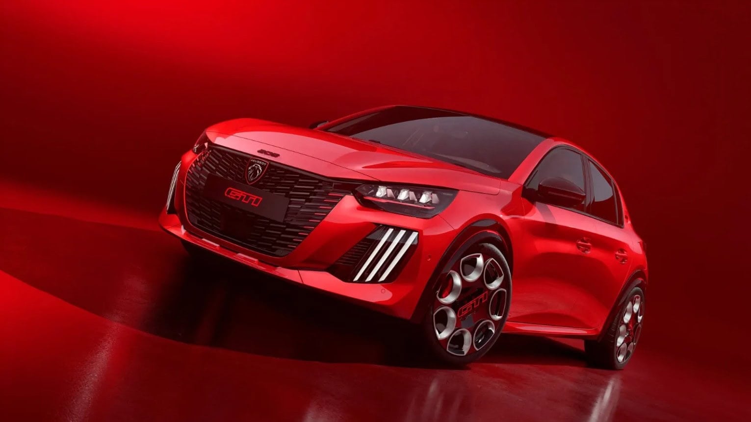 Nový Peugeot E-208 GTi na trati
